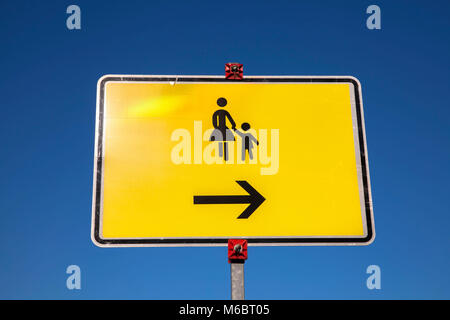 Germany, Cologne, sign for mother with child.  Deutschland, Koeln, Wegweiser fuer Mutter mit Kind. Stock Photo