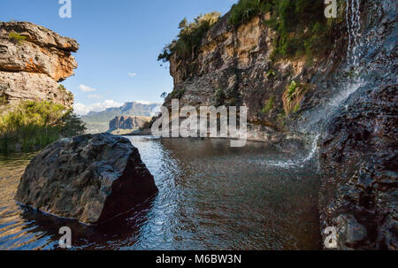 Waterfall flowing into river. South African Mountains. South African Landscape. Stock Photo