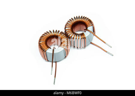 Inductor Copper coils isolated on white background Stock Photo