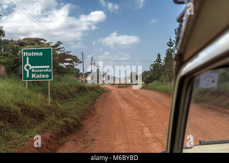 Road to Hoima Village en route from Murchisons falls National Park to Kimbale National Park south-west Uganda Africa Stock Photo