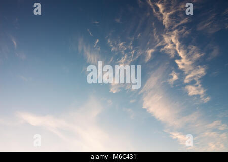 Background of the blue sky with sparse cirrus clouds in the morning Stock Photo
