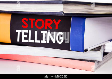 Hand writing text caption inspiration showing Storytelling. Business concept for Teller Story Message written on the book the white background. Stock Photo