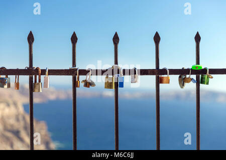 Padlocks of love locked on the fence Stock Photo