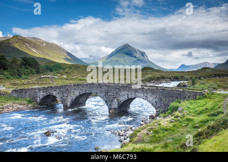 Sligachen Old Bridge over River Sligachan, looking towards Cuillin Hills Isle Of Skye, Scotland. Stock Photo