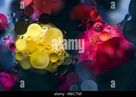 On an abstract blue background yellow and red spots Stock Photo