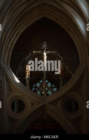 Statue of Jesus Christ on the cross on one of the scissor arches in Wells Cathedral, Wells, Somerset, UK. Stock Photo