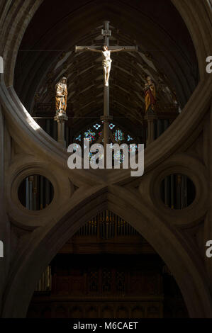 Statue of Jesus Christ on the cross on one of the scissor arches in Wells Cathedral, Wells, Somerset, UK. Stock Photo