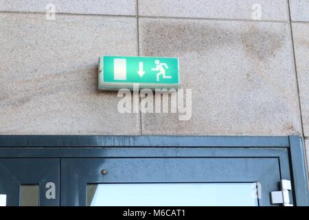 Green Emergency Fire Exit Sign Stock Photo