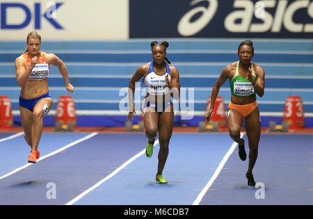 Ivory Coast's Murielle Ahoure (right) wins the Women's 60m to set a new world leading record ahead of Netherlands' Dafne Schippers (left) in third and Great Britain's Asha Philip in fifth during day two of the 2018 IAAF Indoor World Championships at The Arena Birmingham. Stock Photo