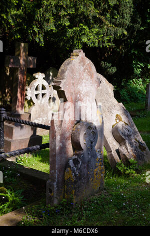 Old tombstones of cemetery at Church of St Martin, the first church founded in England and the oldest parish church in continuous use in Canterbury, K Stock Photo