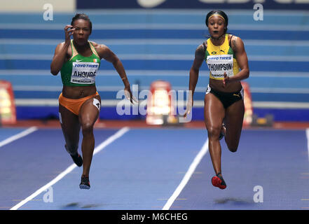 Ivory Coast's Murielle Ahoure (left) on her way to winning gold in the Women's 60m final ahead of Jamaica's Elaine Thompson (right) in fourth during day two of the 2018 IAAF Indoor World Championships at The Arena Birmingham. Stock Photo
