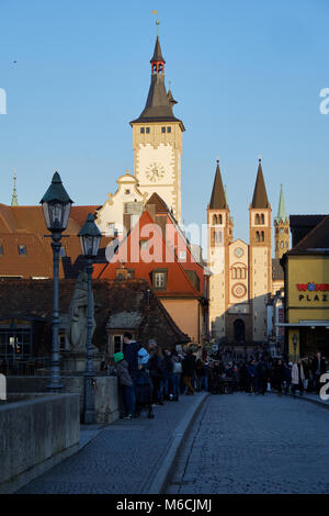 Würzburg, Germany - Februar 14, 2018: View from Old Main Bridge (Alte Mainbrücke) to Altes Rathaus Grafeneckart and Wuerzburger Cathedral (Würzburger  Stock Photo