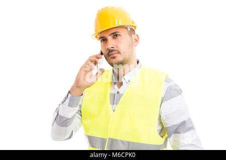 Successful foreman or construction worker talking on the phone isolated on white background Stock Photo