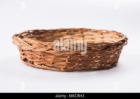 empty cane basket or tokri in hindi and topli in marathi, isolated over white background Stock Photo
