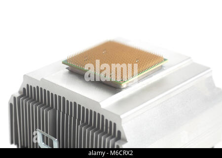 Central processing unit CPU microchip with metal cooler on white background Stock Photo