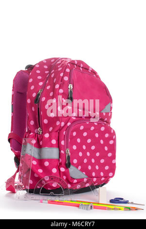 Nice decorative backpack or bookbag with school supplies isolated on white background. Stock Photo