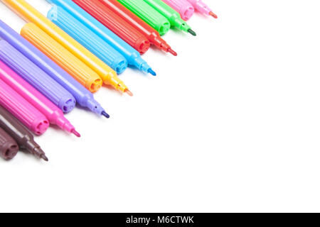 Colored markers isolated on white background. Stock Photo