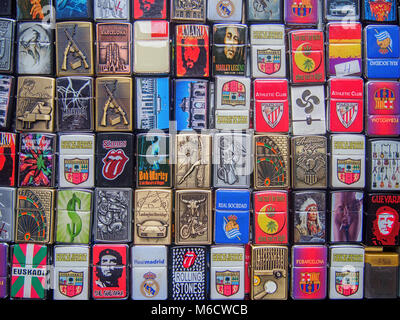BILBAO, SPAIN-FEBRUARY 11, 2018: Set of different lighters on the market counter at the swap meet in Bilbao old town Stock Photo