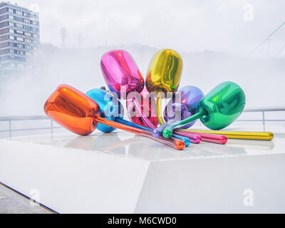 BILBAO, SPAIN-FEBRUARY 11, 2018: The Tulips are a colorful sculpture made of stainless steel by artist Jeff Koons that rests in front of the Guggenhei Stock Photo