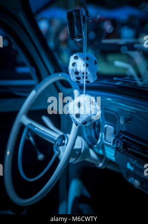 Furry Dice in Car Stock Photo