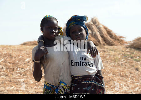 Two young, ethnic, indigenous Bozo tribe girls. Mali, West Africa. Stock Photo