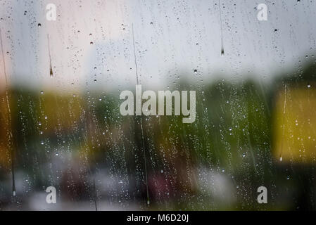 rain drops on window pane - blurred for effect for background use Stock Photo