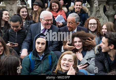 02 March 2018, Portugal, Porto: German President Frank-Walter Steinmeier (Centre L) and President of Portugal, Marcelo Rebelo de Sousa, sit together with youths in the old town. German President Steinmeier is in Portugal for a two-day visit. Photo: Bernd von Jutrczenka/dpa Stock Photo