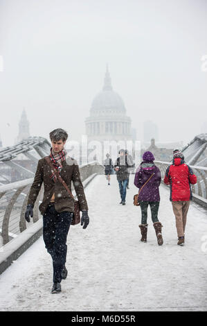 London, UK. 2nd Mar, 2018. People seen at the Millenium Bridge under snowy weather. Credit: B Rouco-3092.jpg/SOPA Images/ZUMA Wire/Alamy Live News Stock Photo