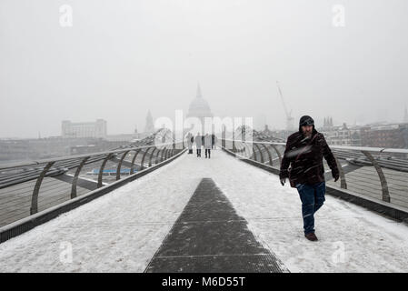 London, UK. 2nd Mar, 2018. People seen at the Millenium Bridge under snowy weather. Credit: B Rouco-3125.jpg/SOPA Images/ZUMA Wire/Alamy Live News Stock Photo