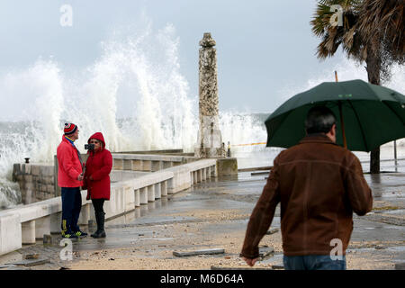 Lisbon, Portugal. 2nd Mar, 2018. A couple make a selfie during the strong swell that is felt at Paco de Arcos, outskirts of Lisbon and in all the Portuguese coast, on March 2, 2018. Credit: Pedro Fiuza/ZUMA Wire/Alamy Live News Stock Photo