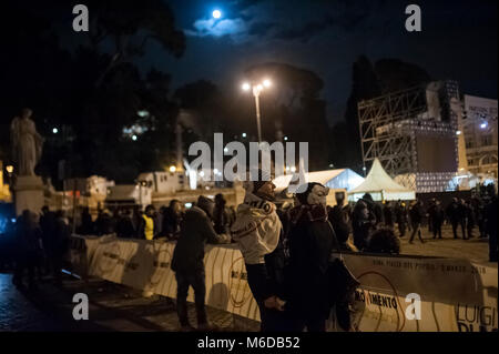 Rome, Italy. 02 Mar 2018. Populist party 5-Star Movement hold its final electoral rally in Piazza del Popolo. On the stage, there was a long speech by Luigi di Maio, the 31 year old candidate Premier and the would-be cabinet team. To support their candidature also there were the parliamentarian Paola Taverna, the deputy Roberto Fico and Roberta Lombardi, candidate for the Presidency of Lazio Region. Also among the guest on the stage figured Beppe Grillo, the Italian comedian who is the founder of the movement, and Alessandro Di Battista, called “the warrior” by 5-Star Movements’ supporters. Cr Stock Photo