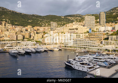 Monaco, Principality of Monaco - November 3, 2015: The view of the  Port Hercules and  the southwestern ward of the second smallest and the most dense Stock Photo