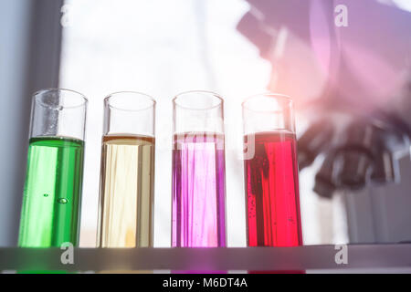 Laboratory tube is used by scientists and students for analysis and study in chemical laboratories, for research experiments in science. Stock Photo