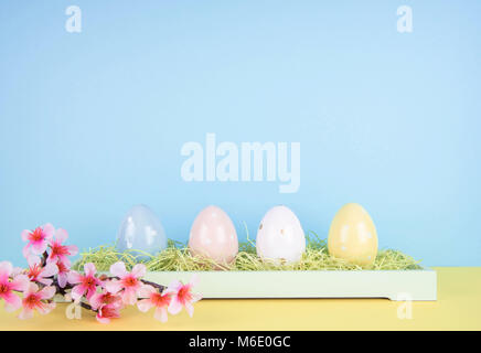 Creative easter composition with painted eggs. Stock Photo