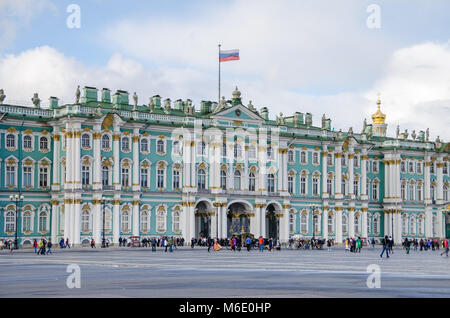 Saint Petersburg, Russia - September 30 , 2016:  The principal baroque facade of the Winter Palace facing the Palace Square with many tourists Stock Photo
