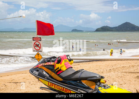 Red flag danger and stinger nets for safety on Palm Cove beach in far north Queensland,Australia Stock Photo