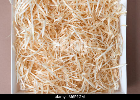 Opened Gift Box With Decorative Straw Filler Shavings Stock Photo