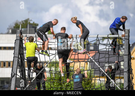 Climbing obstacles at Action run 2017 obstacle race run in the city of Norrköping, Sweden in September 2017 Stock Photo