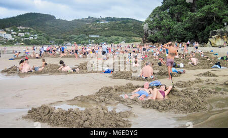 People on Hot Water Beach, Coromandel Peninsula, South Island, New Zealand Stock Photo