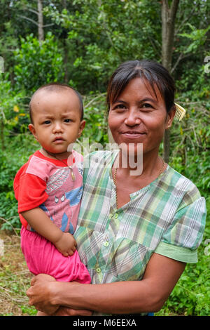 Pyin Oo Lwin, Myanmar - November 18 2014. Coffee plantation worker with child Stock Photo