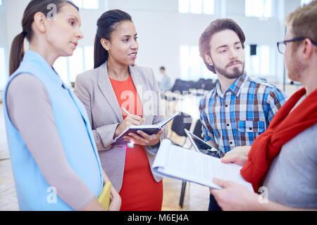 Discussing reports Stock Photo