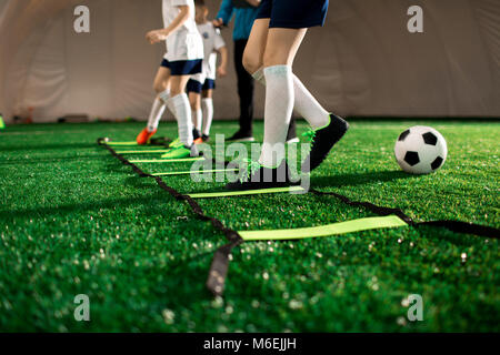 Exercising on pitch Stock Photo