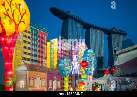 19.02.2018, Singapore, Republic of Singapore, Asia - Colourful illuminated decoration for the Chinese New Year Festival on the float at Marina Bay. Stock Photo