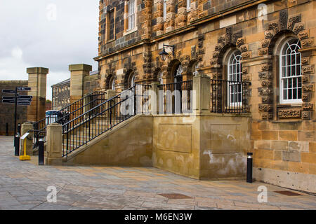 A look behind the prison walls into the prison yard of the old Crumlin Road Jail in Belfast Northern Ireland with its imposing Victorian architecture Stock Photo