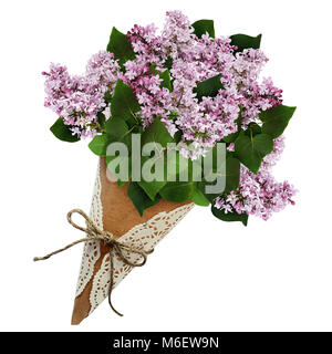 Lilac flowers bouquet in a craft paper cornet isolated on white Stock Photo