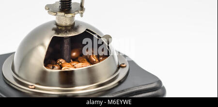 Authentic hand Coffee grinder with beans in Stock Photo