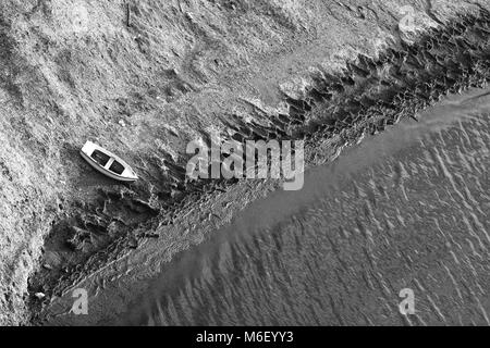 small  rowing boat on  beach from above Stock Photo
