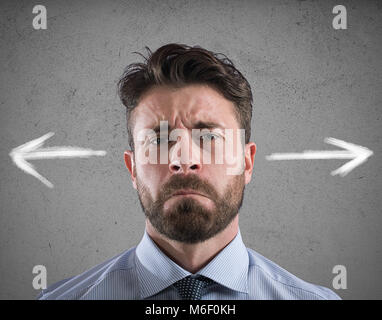 Difficult choices of a businessman. concept of confusion Stock Photo