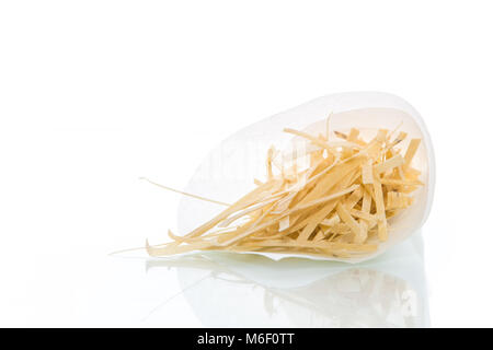 homemade egg noodles in a paper package Stock Photo