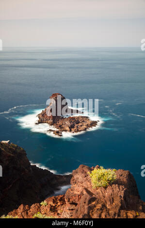 A selective focus shot of colorful rocks on the sea shore Stock Photo ...
